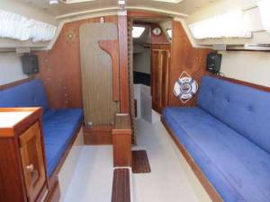 Catalina 25 with Traditional Interior, Table Raised, Showing Swing Keel Trunk